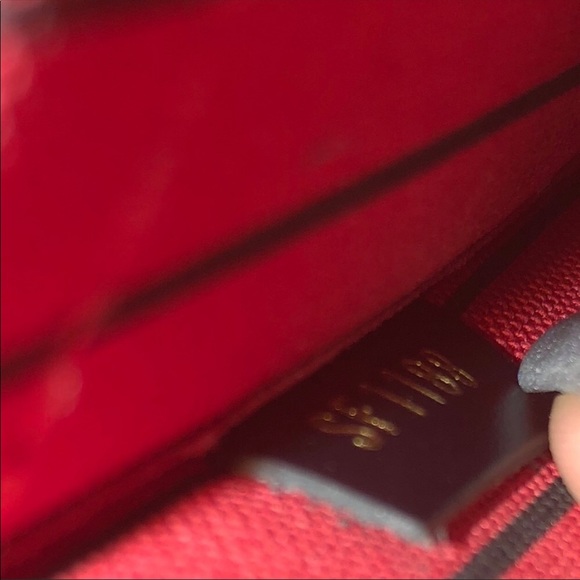 LV wristlet from World Tour collection. Authentic